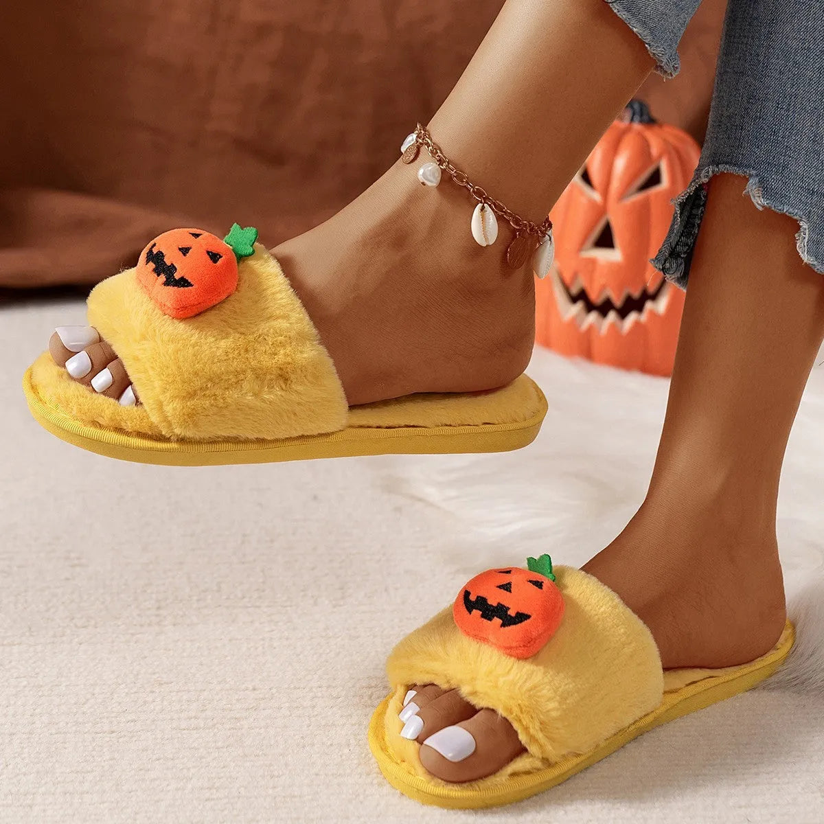 Pumpkin plush slippers indoor home slippers open toe design anti-slip PVC sole synthetic fur warm winter bedroom slippers for women available in white and yellow colour multi-size cartoon Halloween cute